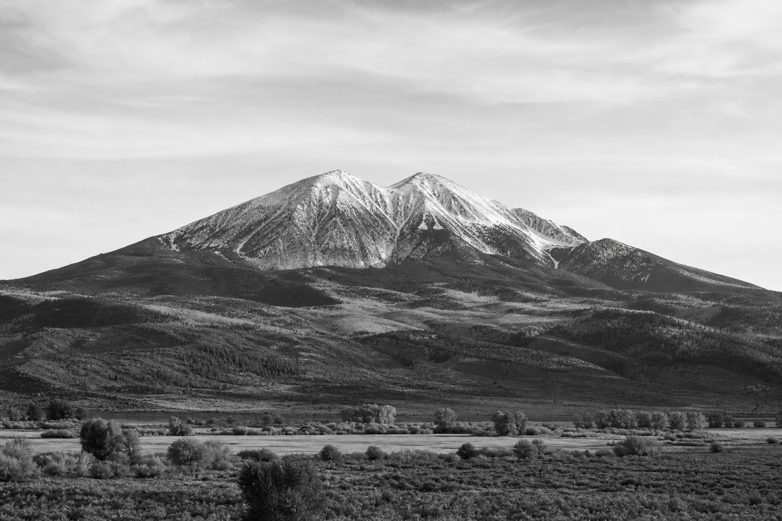 Mount Sopris rising over the Roaring Fork Valley, Colorado — black and white